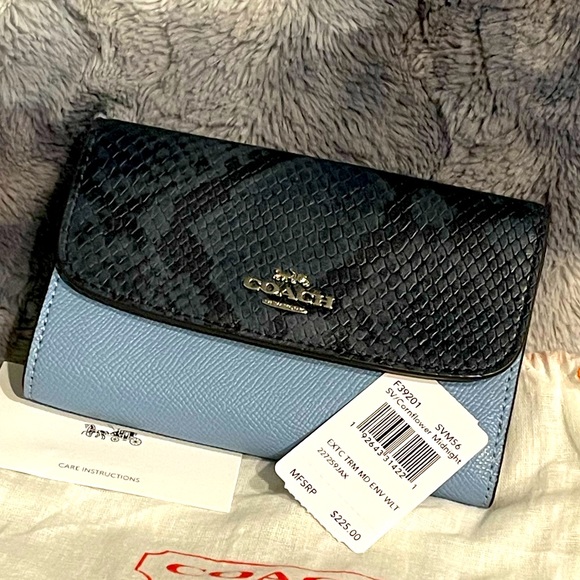 ❌SOLD❌ Coach Wallet blue and black, silver hardware. Used once in new condition. - Picture 7 of 7